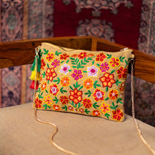 Load image into Gallery viewer, A beautiful Bageecha Beige Bag handbags for women kept on a chair with beautiful background.