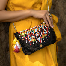Load image into Gallery viewer, A women posing with Masai Bag Black handbags for women.