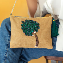 Load image into Gallery viewer, A women posing with beautiful Coco Bag Beige handbags for women.