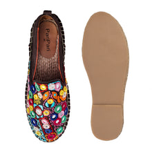 Load image into Gallery viewer, A pair of Nomad Espadrilles Brown shoes for women, against a white background where one is shown from the sole side.