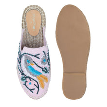 Load image into Gallery viewer, A pair of blush pink flats exclusive ladies shoes, against a white background where one is shown from the sole side.