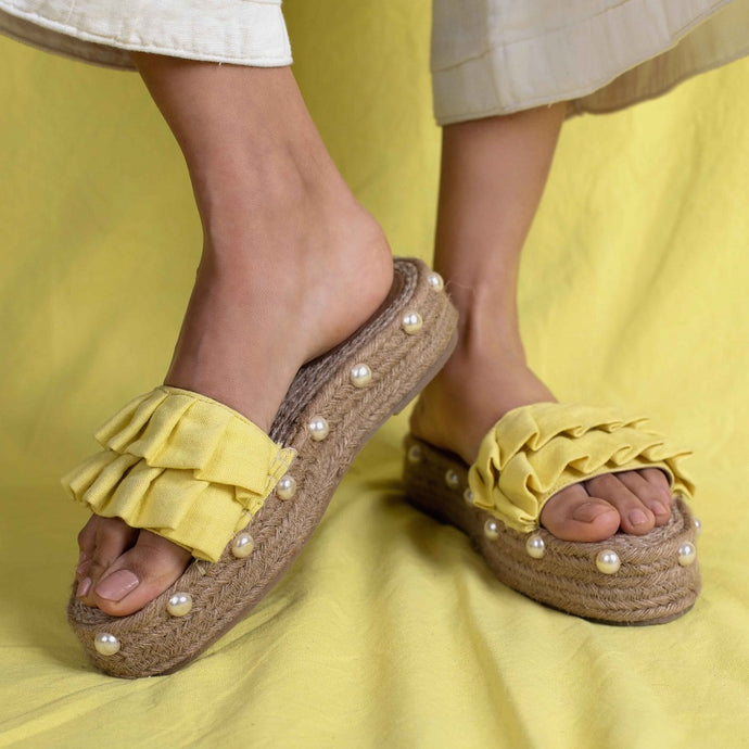 A feet of lady wearing a Majorica Sandals Yellow- Office Wear Ladies Footwear