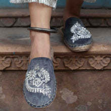 Load image into Gallery viewer, Feet of a model wearing beautiful Ottoman Silver Espadrilles Flats showcasing juttis for women with a kada in the right leg standing on a staircase
