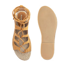 Load image into Gallery viewer, Photo of a pair of tan Gladiator Sandals, featuring multiple straps, one view facing forward and the other view facing backwards on a white background.