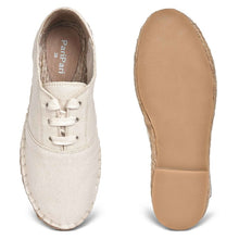 Load image into Gallery viewer, A pair of The Havana Lace-ups - Off-White Supportive Shoes for Women, against a white background where one is shown from the sole side
