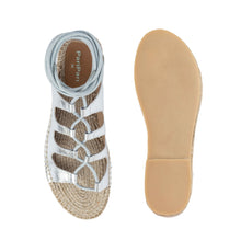 Load image into Gallery viewer, An adorable silver pair of shoe on a white background, one view facing forward and the other view facing backwards.
