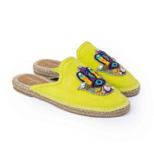 Load image into Gallery viewer, a side view of a pair of Hamsa green espadrilles flats having evil eye protector design, kept on a white background.