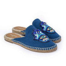 Load image into Gallery viewer, a side view of a pair of Hamsa Blue espadrilles flats having evil eye protector design on a white background