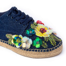 Load image into Gallery viewer, Photo of a single blue espadrilles decorated with colorful flowers on a white background.