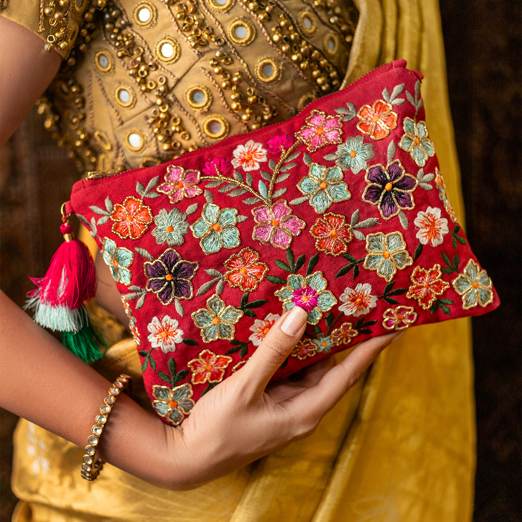 A women posing with beautiful Bageecha Red Bag exclusive handbag for women. 
