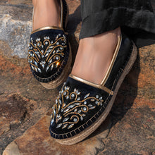 Load image into Gallery viewer, A woman has worn beautiful Diva Black Espadrilles footwear for women, kept upon a marble stone.
