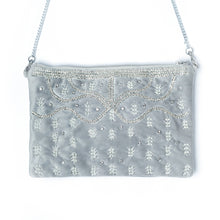 Load image into Gallery viewer, An elegant Kaira Silver Bag exclusive handbags for women kept on a white background.
