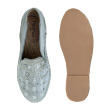 Load image into Gallery viewer, A pair of Kaira Silver Espadrilles ladies shoes, against a white background where one is shown from the sole side.
