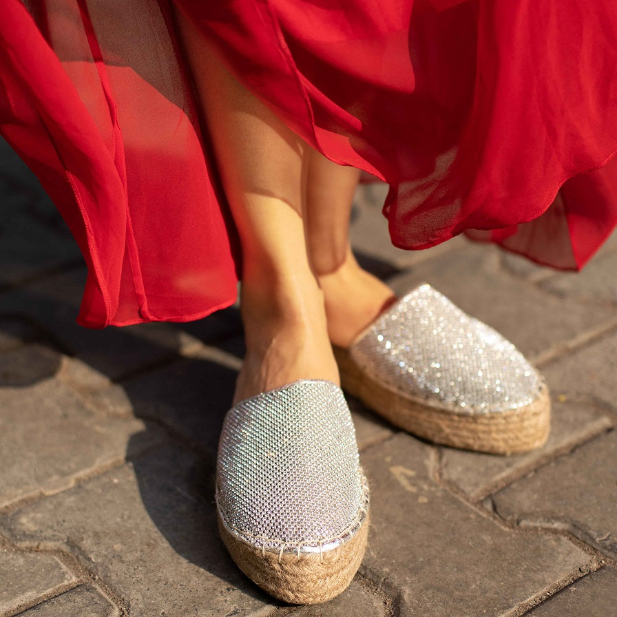 A feet of lady wearing a Jhil Mil Espadrilles for Girls, footwear for women