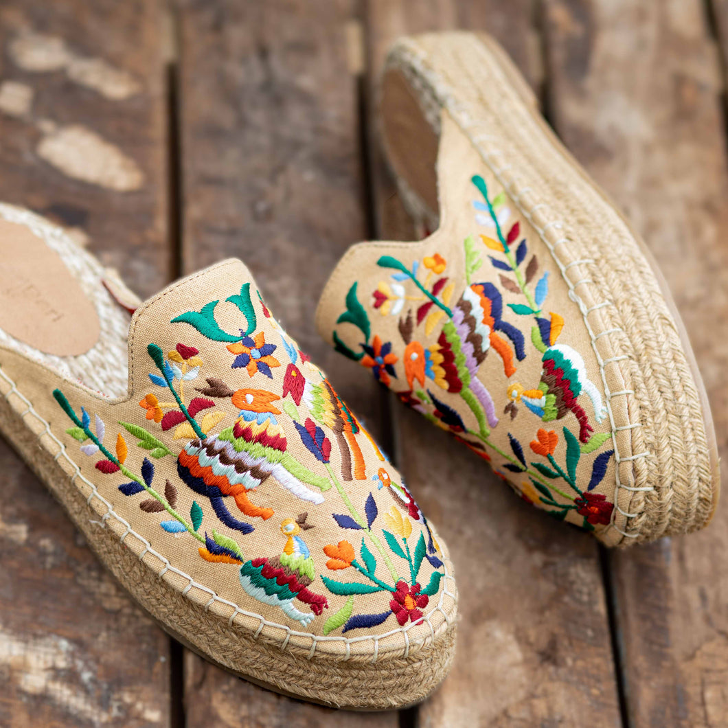Image of Environment-Friendly Diego Espadrilles Sand Haut Platform, Shoes for women on the pebbles against a blue wall