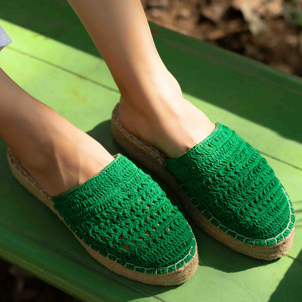 A feet of a model wearing beautiful Croshia Green Espadrilles Platform showcasing juttis for women