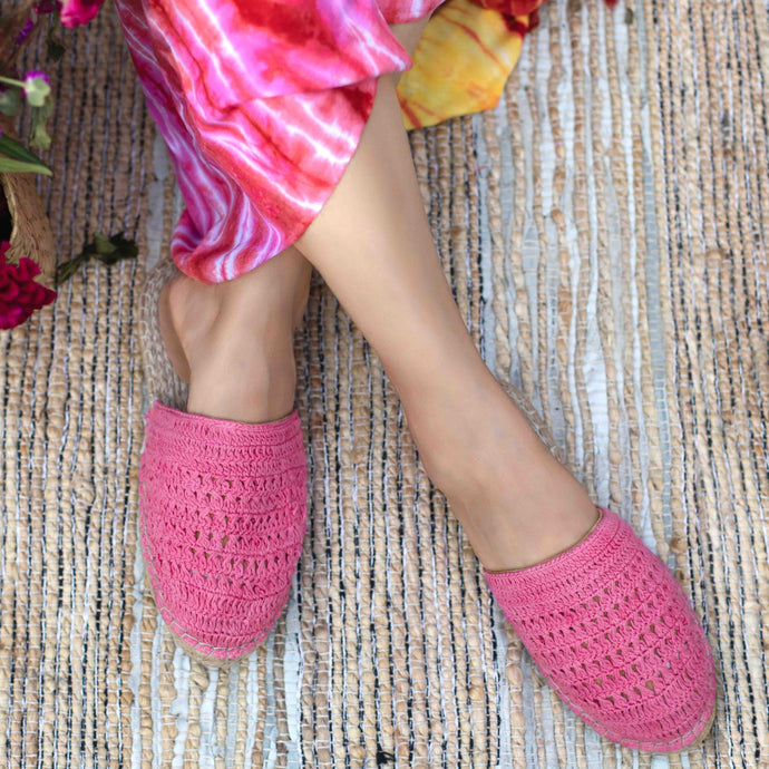 A feet of a model wearing beautiful Croshia Pink Esapdrilles Flats showcasing juttis for women