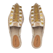 Load image into Gallery viewer, A pair of golden Espadrilles with a small detailing on them with a pattern around the bottom and sides on a white background.
