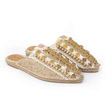 Load image into Gallery viewer, Photo of a pair of Ibiza Espadrilles Flats, featuring a beige canvas upper with yellow and silver stripes on the platform sole. 
