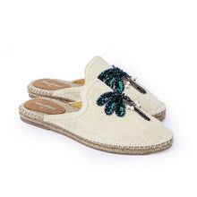 Load image into Gallery viewer, a side view of a pair of coco off-white Espadriles flats with green color palm tree on top of it on a white background
