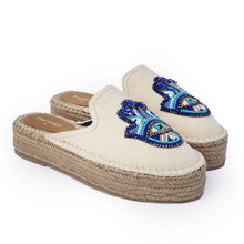 Load image into Gallery viewer, a side view of a pair of Hamsa off-white espadrilles platforms having evil eye protector design on a white background
