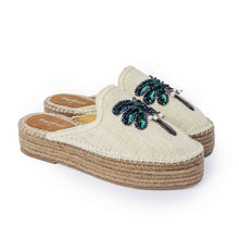 Load image into Gallery viewer, A side view of a pair of coco off-white espadrilles platform with a green palm tree on top of it on a white background
